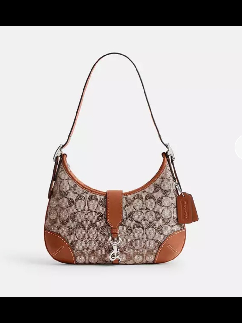 Coach Hamptons Hobo Bag
In Crystal Signature Jacquard
